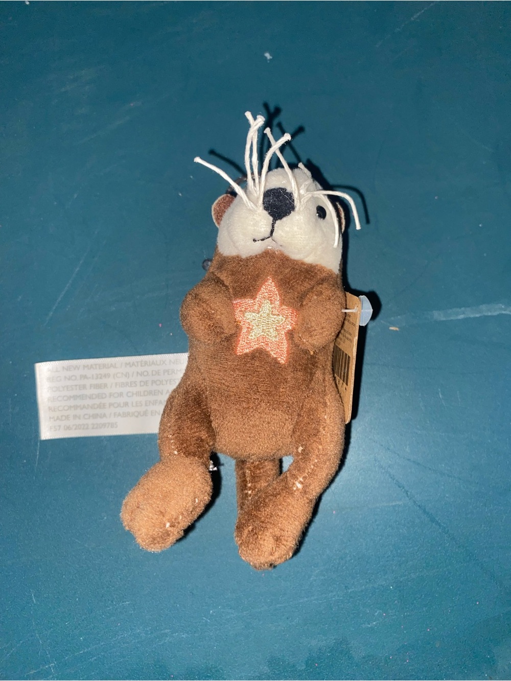 Monterey Bay Brown Plush Otter Toy with Star Patch